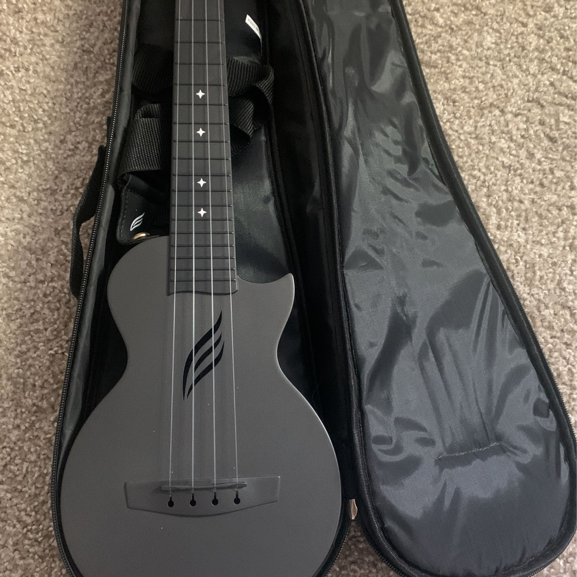 Enya Ukulele With Extra Strings, Capo And Strap for Sale in Mesa, AZ OfferUp