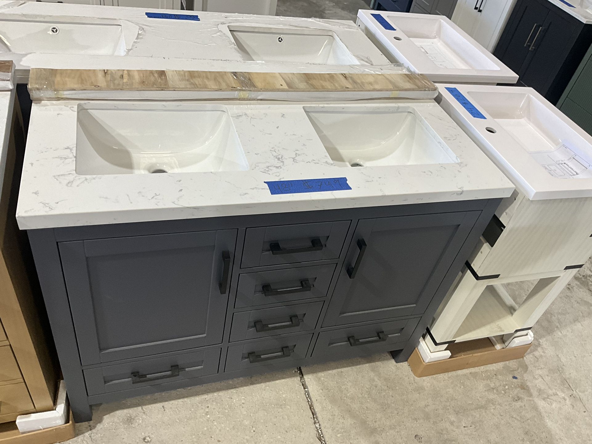 48” Bathroom Vanity in grey , double sink soft close solid wood with vanity top in white  $749  Luke’s liquidations warehouse Address:  2434 N Forsyth