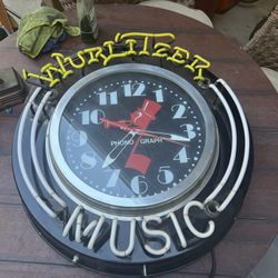 Wurlitzer 30 in neon can clock been in a storage for years needs a piece of neon repaired it was hard wired at one time so going to need a cord sellin