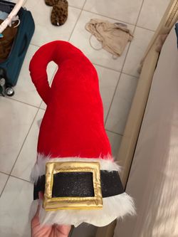 Santa hat tree topper and small sign