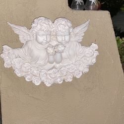 Beautiful wall hanging cherub statue very unique