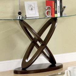 The modern and contemporary styling of these living room tables will add elegance to your home. Finished in dark walnut, each with a unique cross-oval