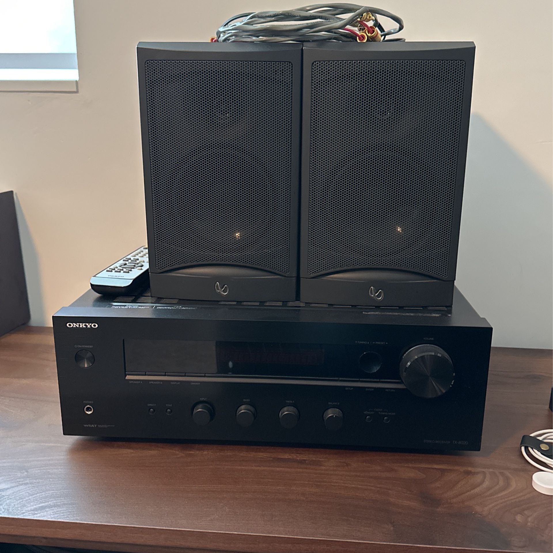 Onkyo Receiver, Two Speakers Plus Speaker Wires, And Remote