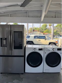 Like new refrigerator and washer and gas dryer
