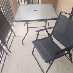 Patio Table With 4 Matching Folding Chairs
