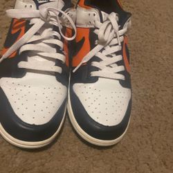 Nike Black, White, And orange shoes No scuffs Or marks