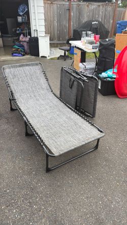 Two identical tanning loungers