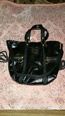Bolsa coach buenas condisiones muy limpia por dentro y por fuera