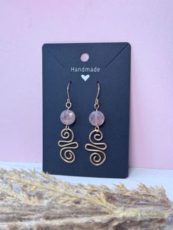 Gold wire wrapped earrings with strawberry quartz gemstones