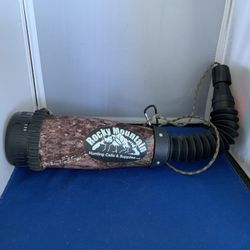 Rocky Mountain Hunting Calls elk bugle tube, designed to amplify and modulate bugle calls for hunting. Includes a camouflage fabric cover to reduce no