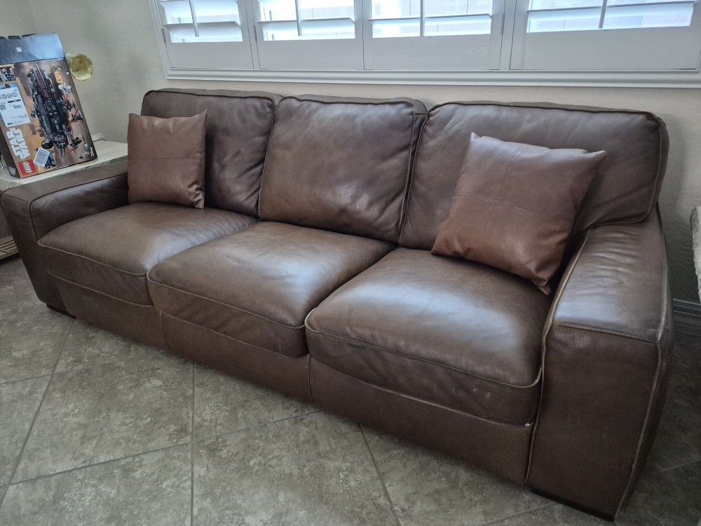 NATUZZI Leather Sofa.