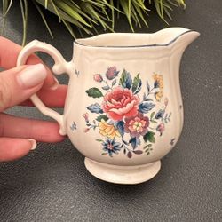 Elegant floral creamer .