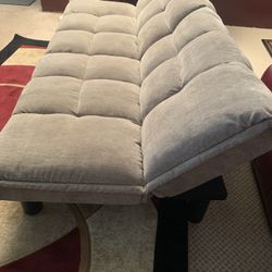 Like new futon, heavy duty, two settings for seating lounge and sitting straight up like a olive color and great shape hit me up with your  best offer