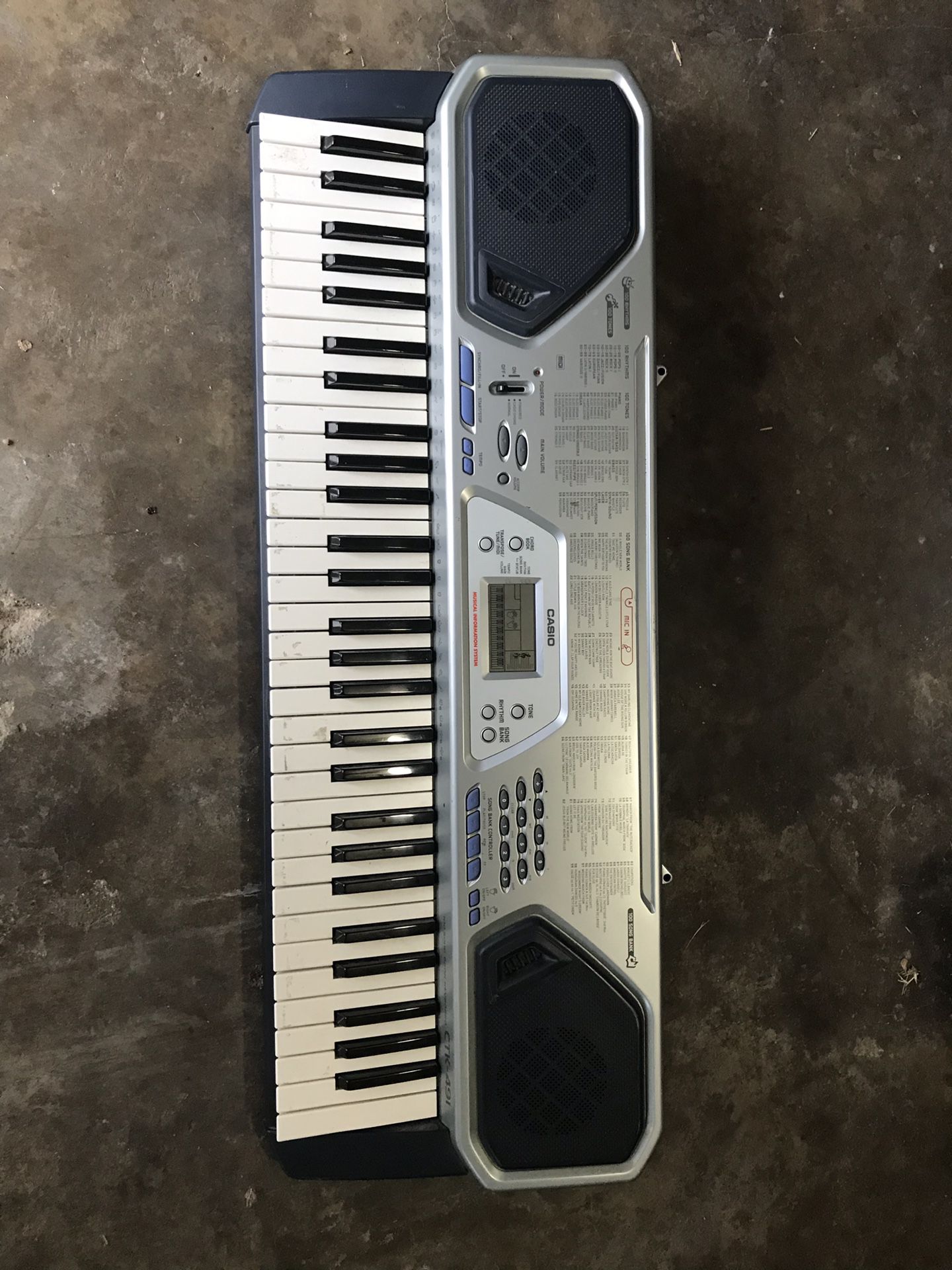 Casio CTK 491 electric piano keyboard 61 keys 100 tones rhythms and song