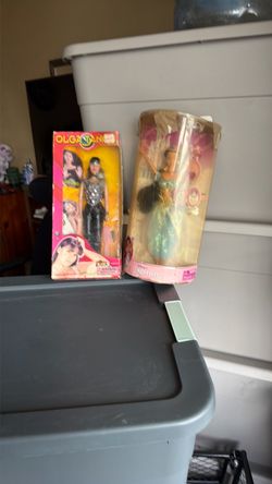 I have two dolls here I have a Spanish singer and princess Jasmine