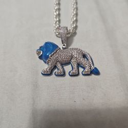 Sterling Silver Moissanite Lion Pendant And 4mm 30in Sterling Silver Chain.