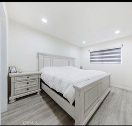 Eastern King Bed + 2 Night stand