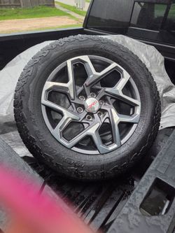 GMC Sierra Rims and Tires $1000 or best offer serious inquiries only
