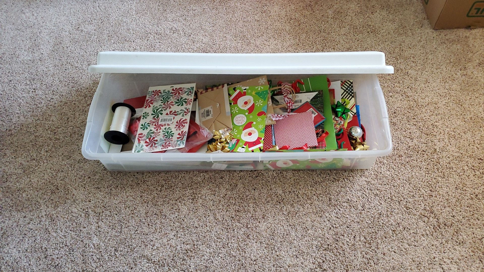 Storage container with xmas gift bags and boxes