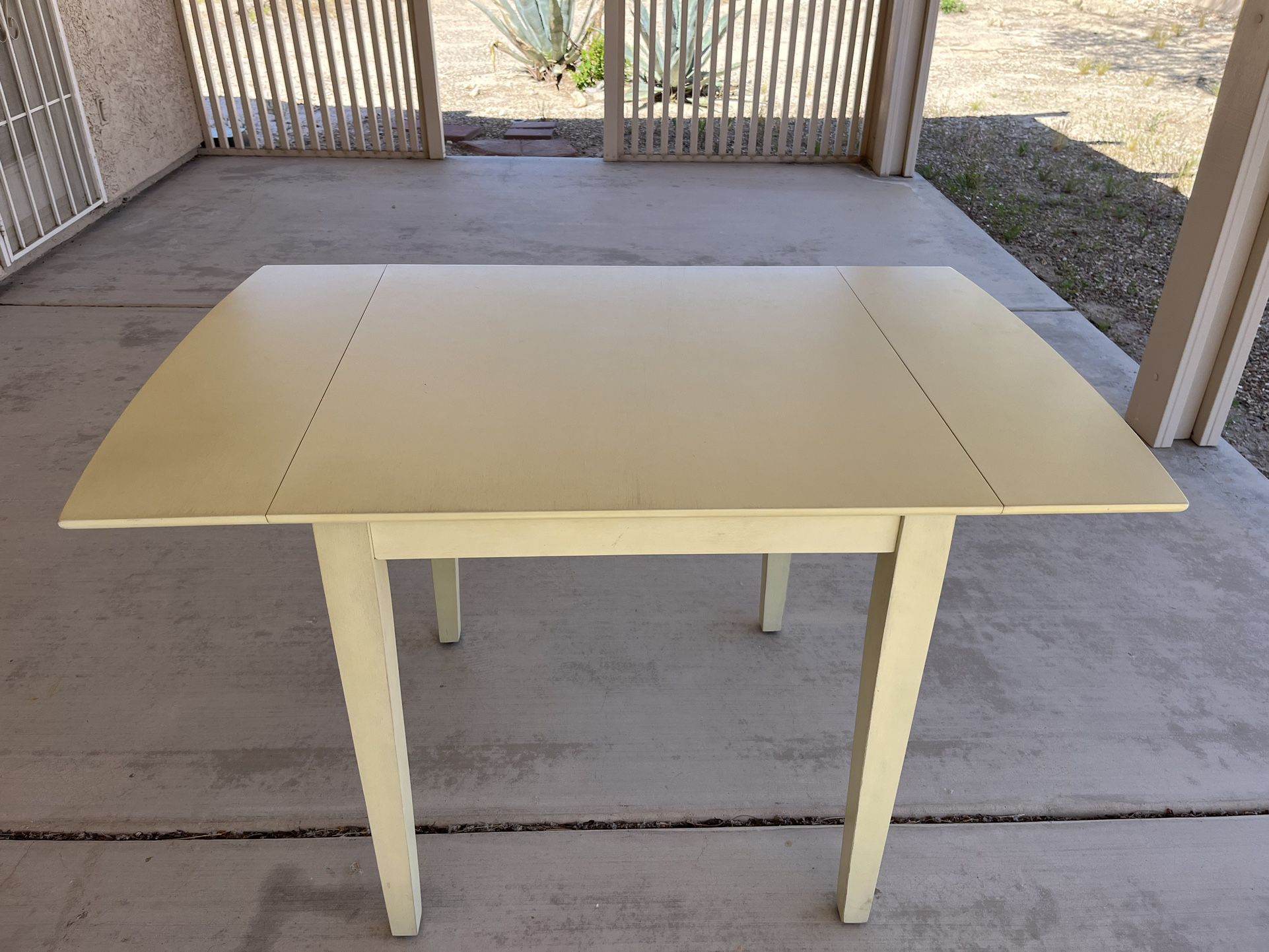 Kitchen Table with collapsible side leaves
