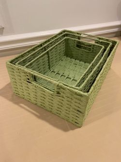 3 nested green woven baskets