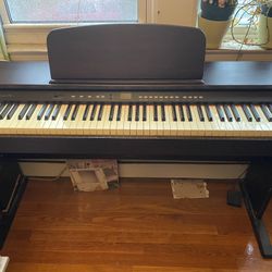 Piano with books