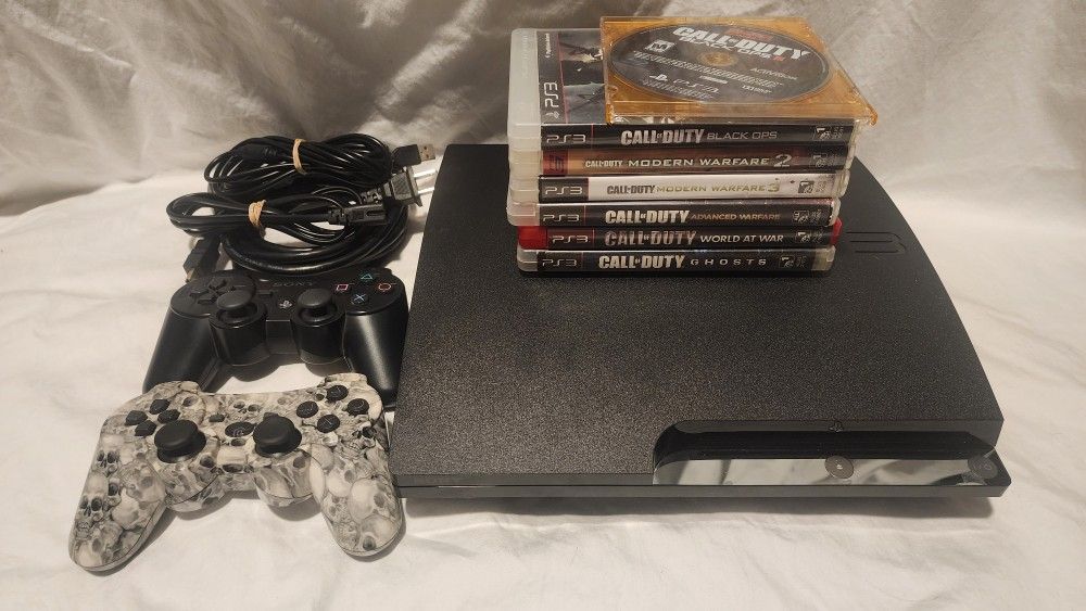Playstation 3 Console Bundle 2 Controllers 7 Games PS3