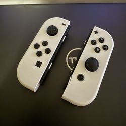 White Nintendo Switch Joycons