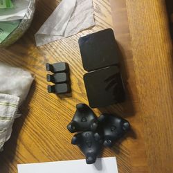 3 vive 3.0 trackers + 3 dongles and 2 base stations.