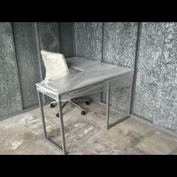 HP monitor and printer with desk and additional table.