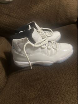 Blue and white Jordan retro 11s