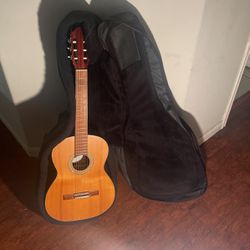 Acoustic Guitar and Levy’s Guitar Bag
