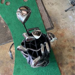 Roller Bag With Nickent Golf Irons 3-P L, Taylormade R7 Driver, Taylormade Burner Rescue 4