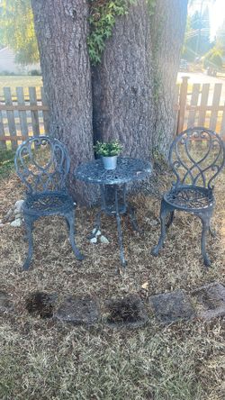 Antique metal patio set