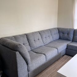 Grey Sectional Couch - Living Spaces “Arrowmask”