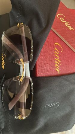 Cartiers Dark Glasses
