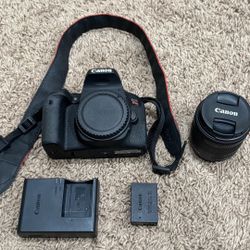 Canon EOS Rebel T7i + 18-55mm Lens