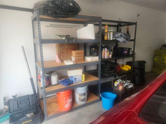 2 costco storage racks and  small tool box with tools