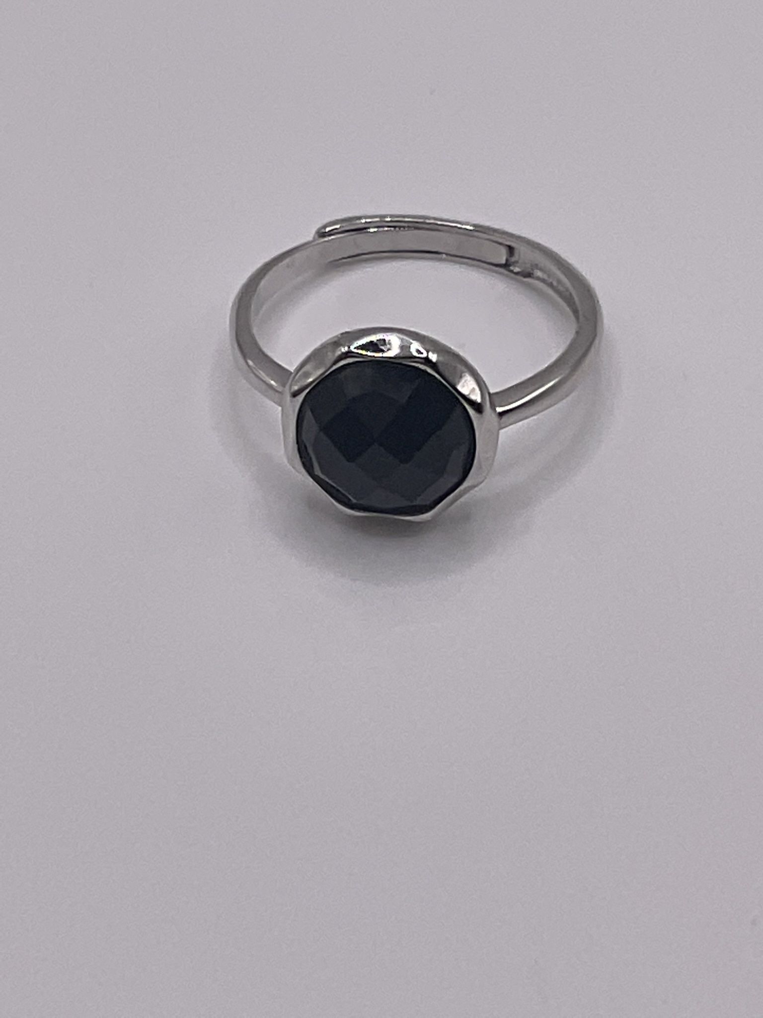 Sterling 925 natural Black Onyx Ring stone origin is from China on an adjustable band.