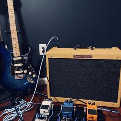 Fender Strat, Fender Tube Amp, and Guitar Pedals