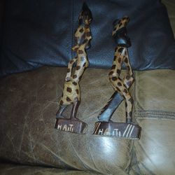 Set Of Two Hating Handmade Wood Carvings