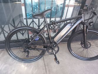 Electric mountain bike. Does 21 mph. No charger