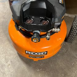 RIDGID 6 Gal. 150 PSI Portable Electric Oil-Free Jobsite Pancake Air Compressor with Dual Pressure Gauges and 2-Quick Couplers