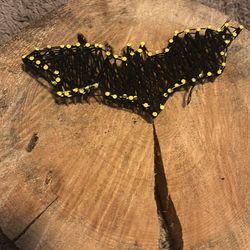 Wood with Batman sign on it