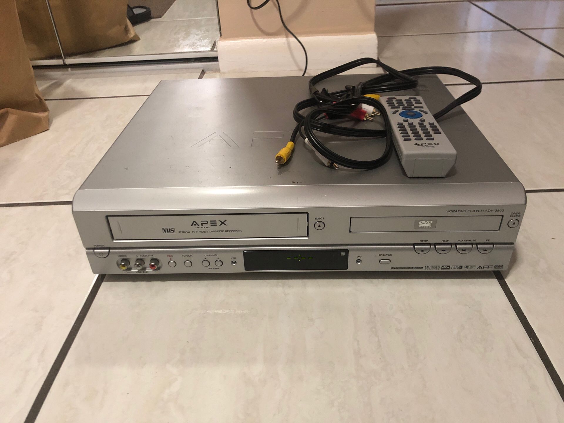 Apex DVD & VHS player w/ cables + remote