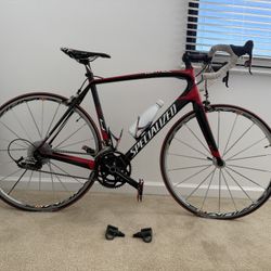 Bike: Specialized Tarmac SL4, featuring a FACT 9r carbon frame, and Mavic Wheels