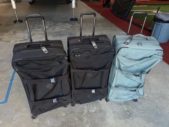 3 Large Kipling Rolling Luggage