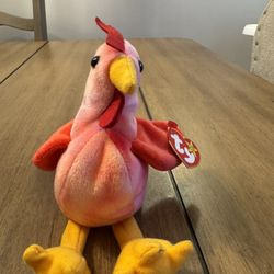 Ty Beanie Baby Strut the Rooster, a collectible plush toy.  