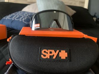 Spy + sunglasses