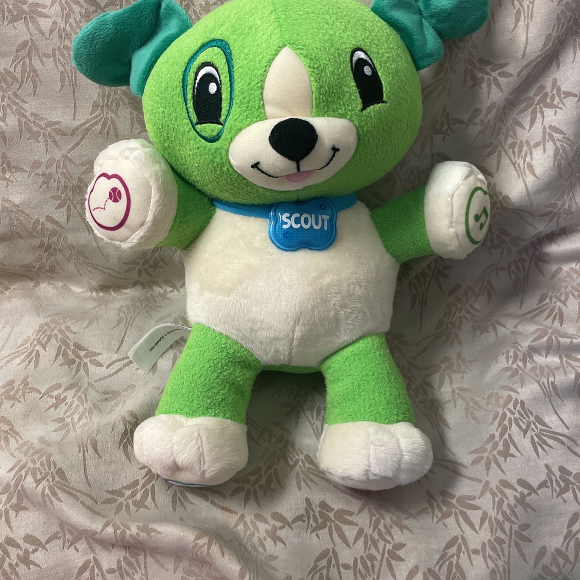 Scout Singing Stuffed Animal Dog